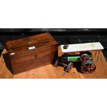 A 19th century mahogany tea caddy, 29 cm wide, to/w a Mamod steam tractor (2)
