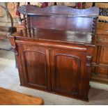 A Victorian mahogany chiffonier with stageback top over a drawer and pair of cabinet doors, 119 x 49