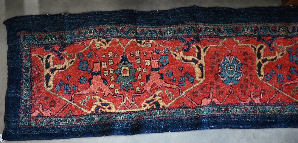 A Persian Bidjar runner with floral design, on red ground with blue borders, 200 x 55 cm - Image 3 of 7