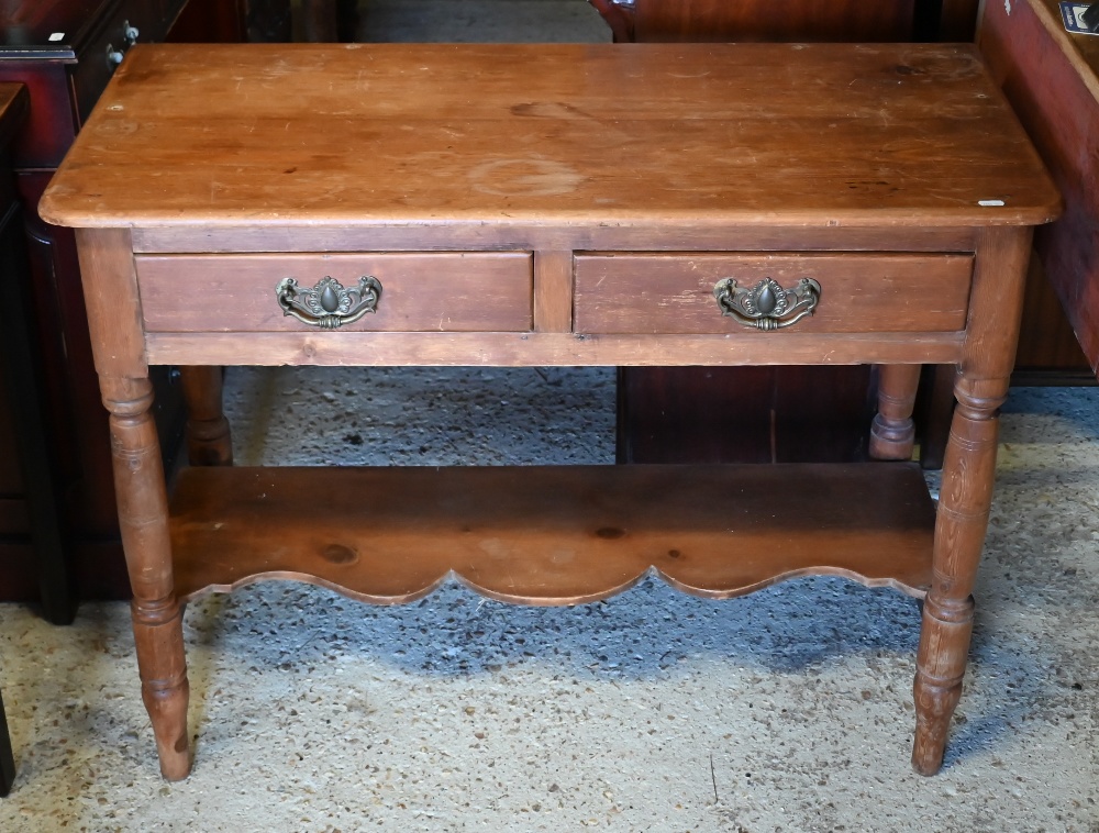 An early 20th century waxed pine hall table with two drawers on turned supports united by undertier, - Image 4 of 4