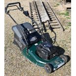 A Hayter Harrier 48 petrol lawn mower with Briggs & Stratton engine c/w grass box (a/f)