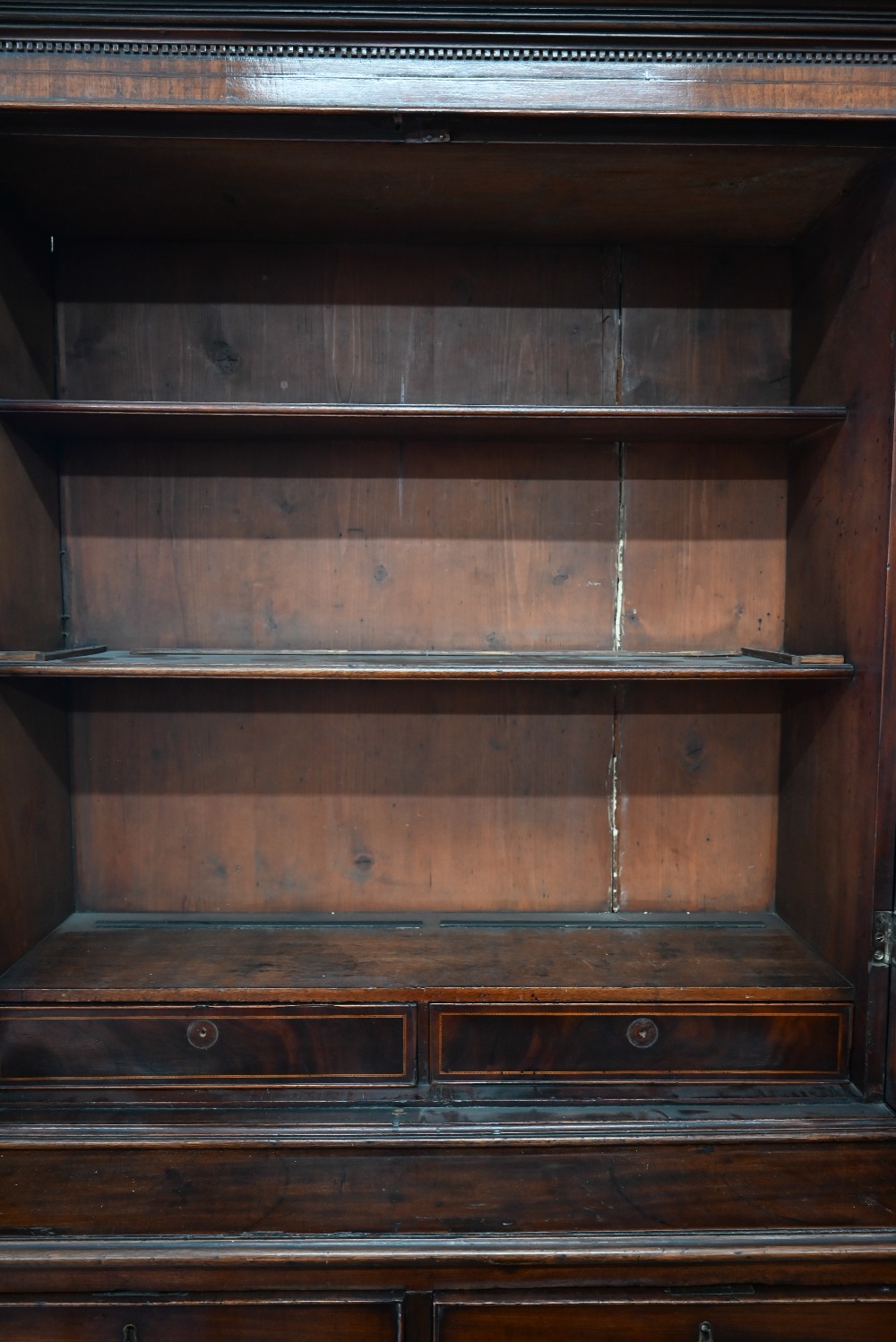 A Georgian mahogany bookcase on chest, the astragal glazed doors over two short and three long - Image 2 of 4