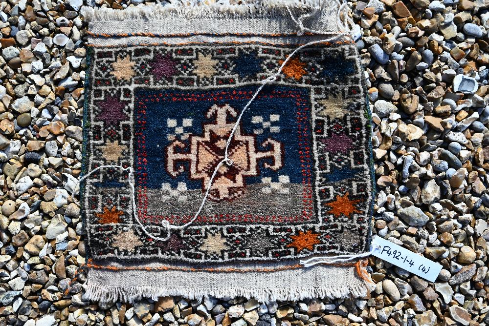 A Persian Turkoman saddle bag, Turkoman carpet bag, large Balouch carpet bag and a Turkish small - Image 4 of 5
