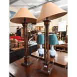 A pair of stained wood cluster-column table-lamps, 69 cm high