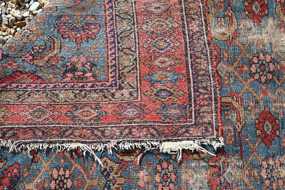 A Persian blue ground rug with Mina-Khani floral design on red borders, 162 x 110 cm - Image 3 of 3