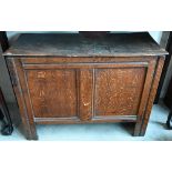 An antique panelled oak coffer, 95 cm wide x 40 cm deep x 70 cm high
