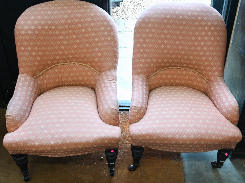 A pair of slipper back nursing chairs, coral foliate upholstery (2)