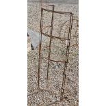 A pair of weathered steel curved garden frames, 60 x 125 cm high (2)