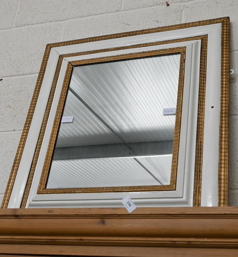 A rectangular wall mirror in moulded cream-painted and gilt frame, 74 x 66 cm