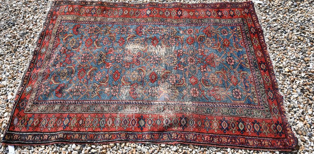 A Persian blue ground rug with Mina-Khani floral design on red borders, 162 x 110 cm