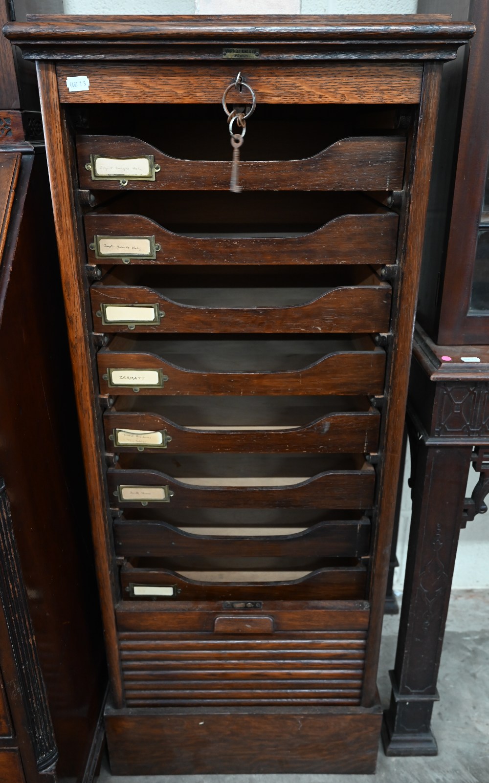 An early 20th century oak tambour front filing chest 'Whitfield King & Co, Ipswich' plaque, c/w key, - Image 2 of 4
