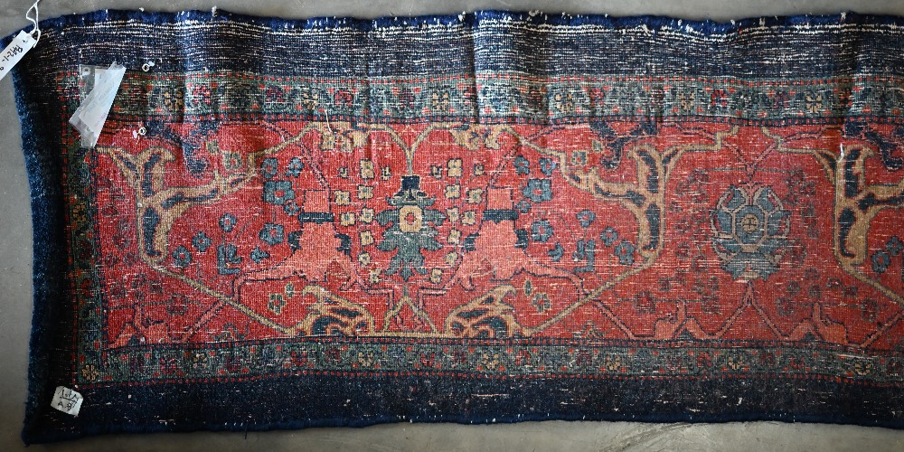 A Persian Bidjar runner with floral design, on red ground with blue borders, 200 x 55 cm - Image 6 of 7