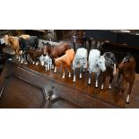 Nine various Beswick china ponies, to/w a small foal and a Beneagles Whisky eagle (11)