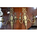 A pair of Adam-style gilt metal twin-branch wall-lights, 45 cm high