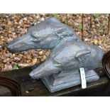 A cast bronzed composite Greyhound head group, 30 x 50 cm