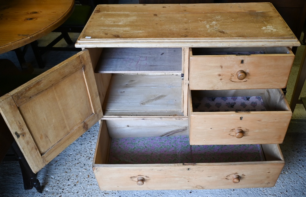 A vintage pine chest with panelled cupboard and three drawers on bracket fee, 96 x 45 x 82 cm high - Image 3 of 4