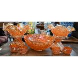 Two Carnival glass punch-bowls on pedestals - one with eight matching glasses, to/w a similar