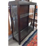 A stained hardwood display cabinet with glazed side panels and four glass shelves (3 lacking