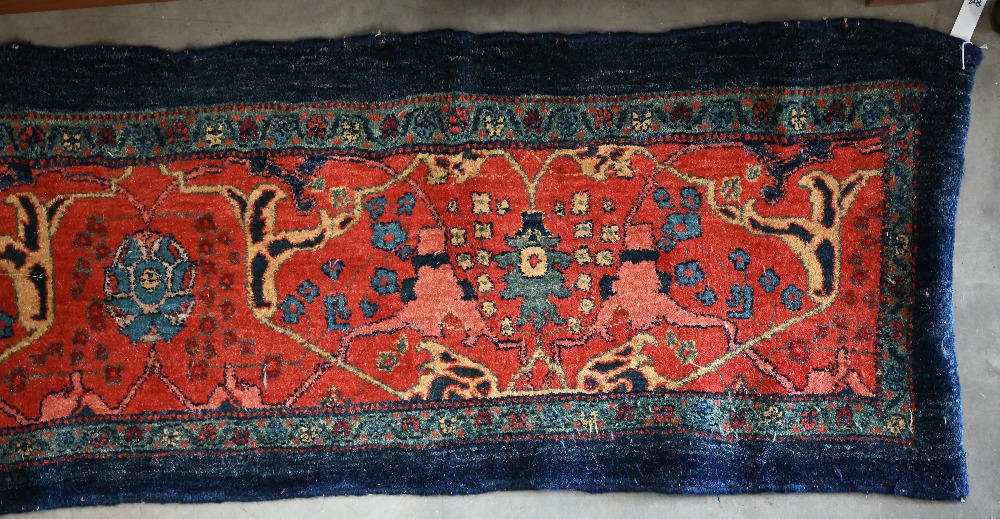 A Persian Bidjar runner with floral design, on red ground with blue borders, 200 x 55 cm - Image 2 of 7