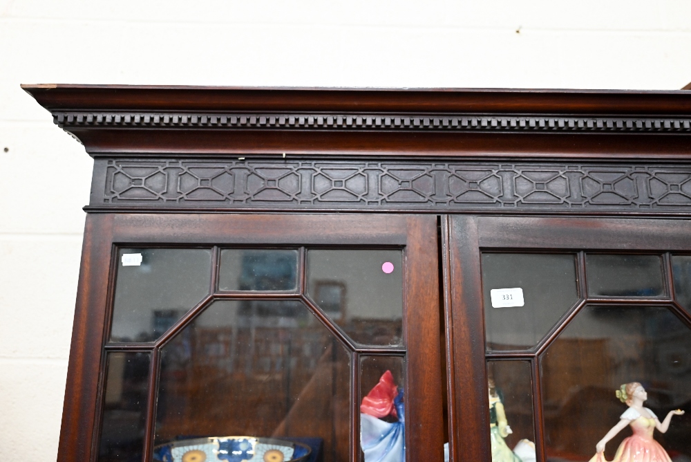 An Edwardian mahogany Chippendale-style bookcase with astragal glazed doors enclosing adjustable - Image 4 of 4