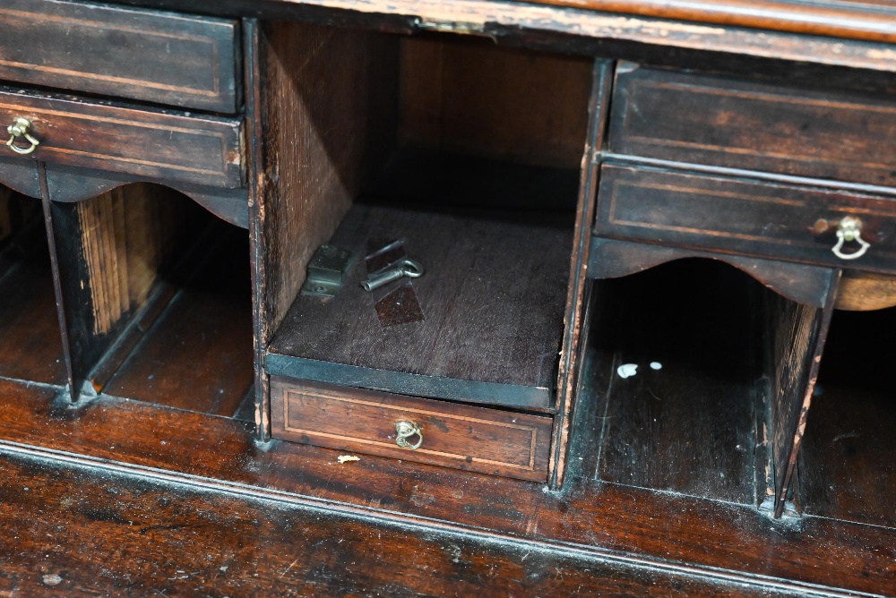 A Georgian mahogany bureau with two short over three long drawers, with associated glazed bookcase - Image 5 of 8