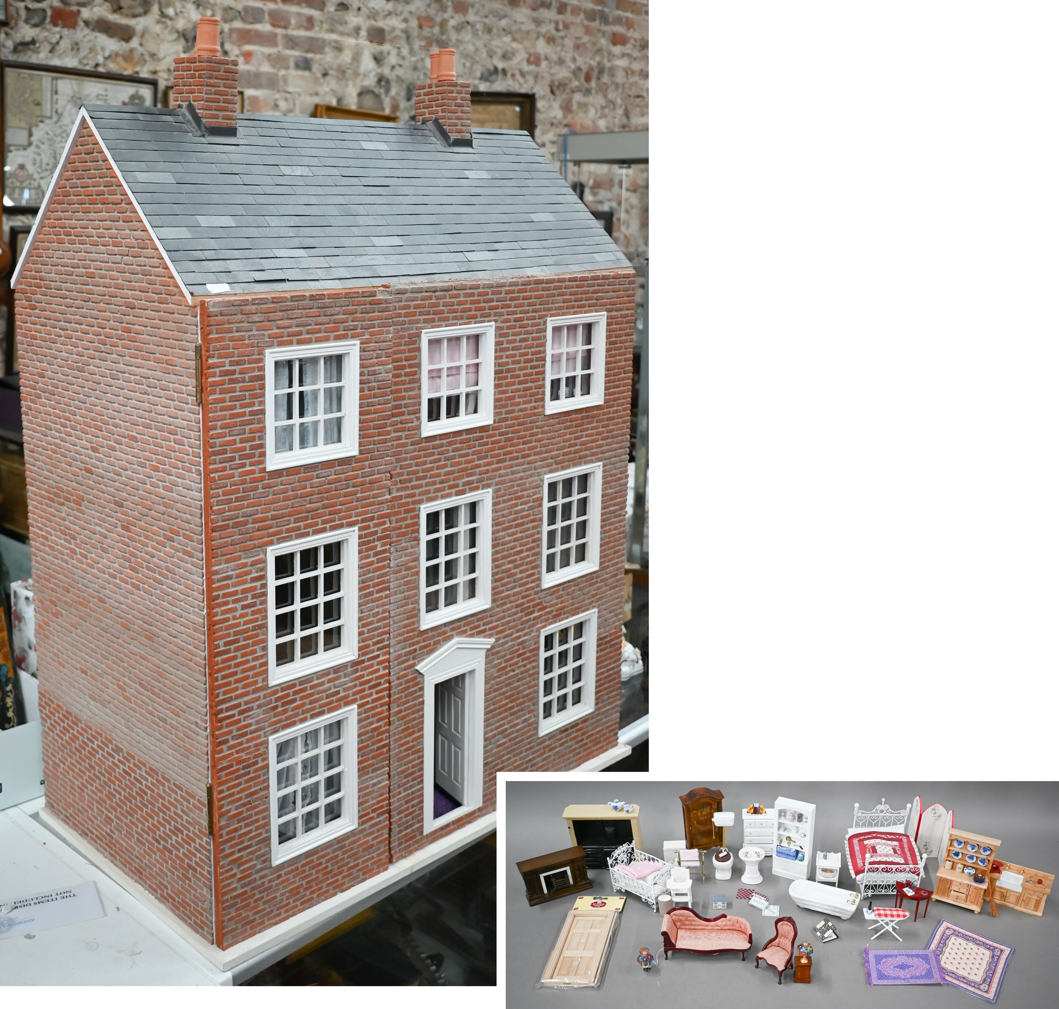 A three storey doll's house and accessories