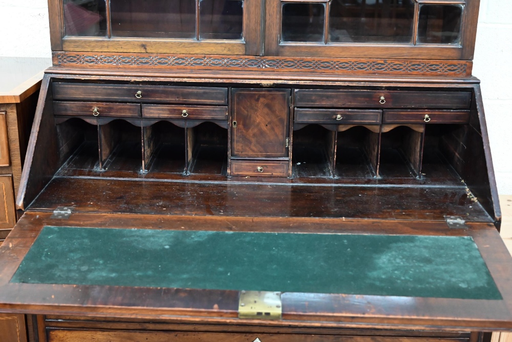 A Georgian mahogany bureau with two short over three long drawers, with associated glazed bookcase - Image 4 of 8