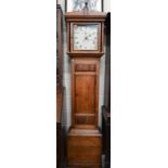 A 19th century oak longcase clock painted dial with thirty hour movement c/w weight and pendulum,