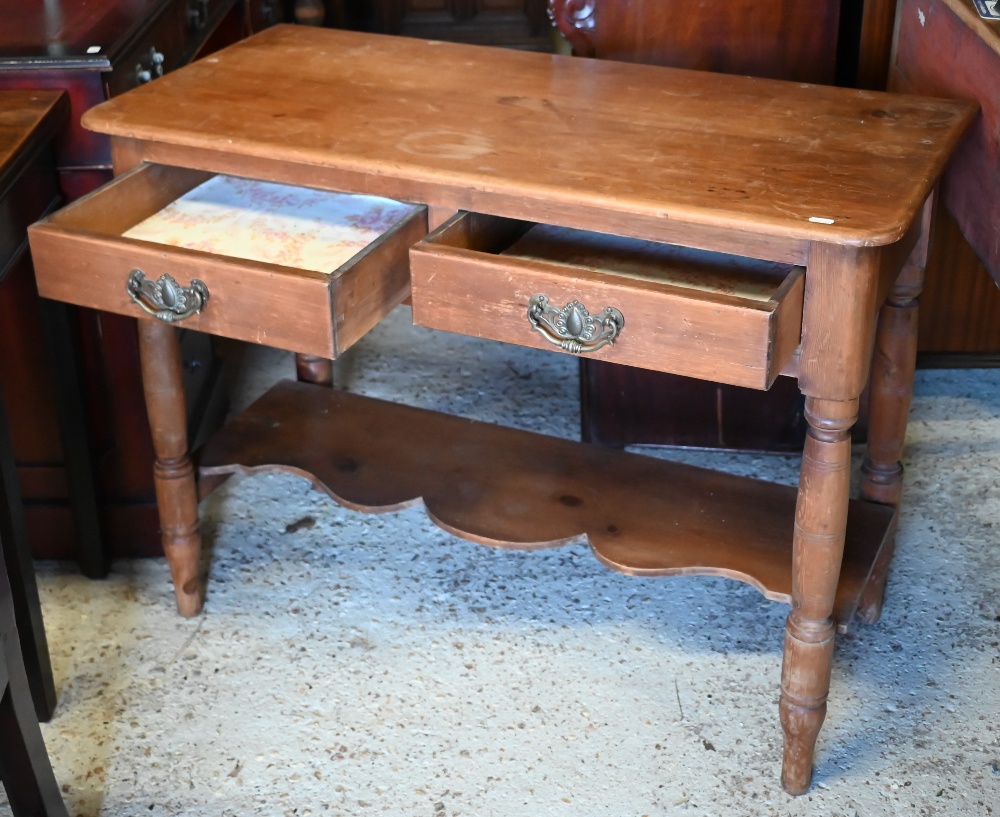 An early 20th century waxed pine hall table with two drawers on turned supports united by undertier, - Image 3 of 4
