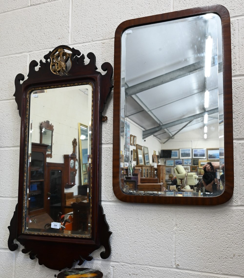 A Georgian-style fret cut mirror surmounted with gilt hoho bird, 48 cm wide x 90 cm high to/w two