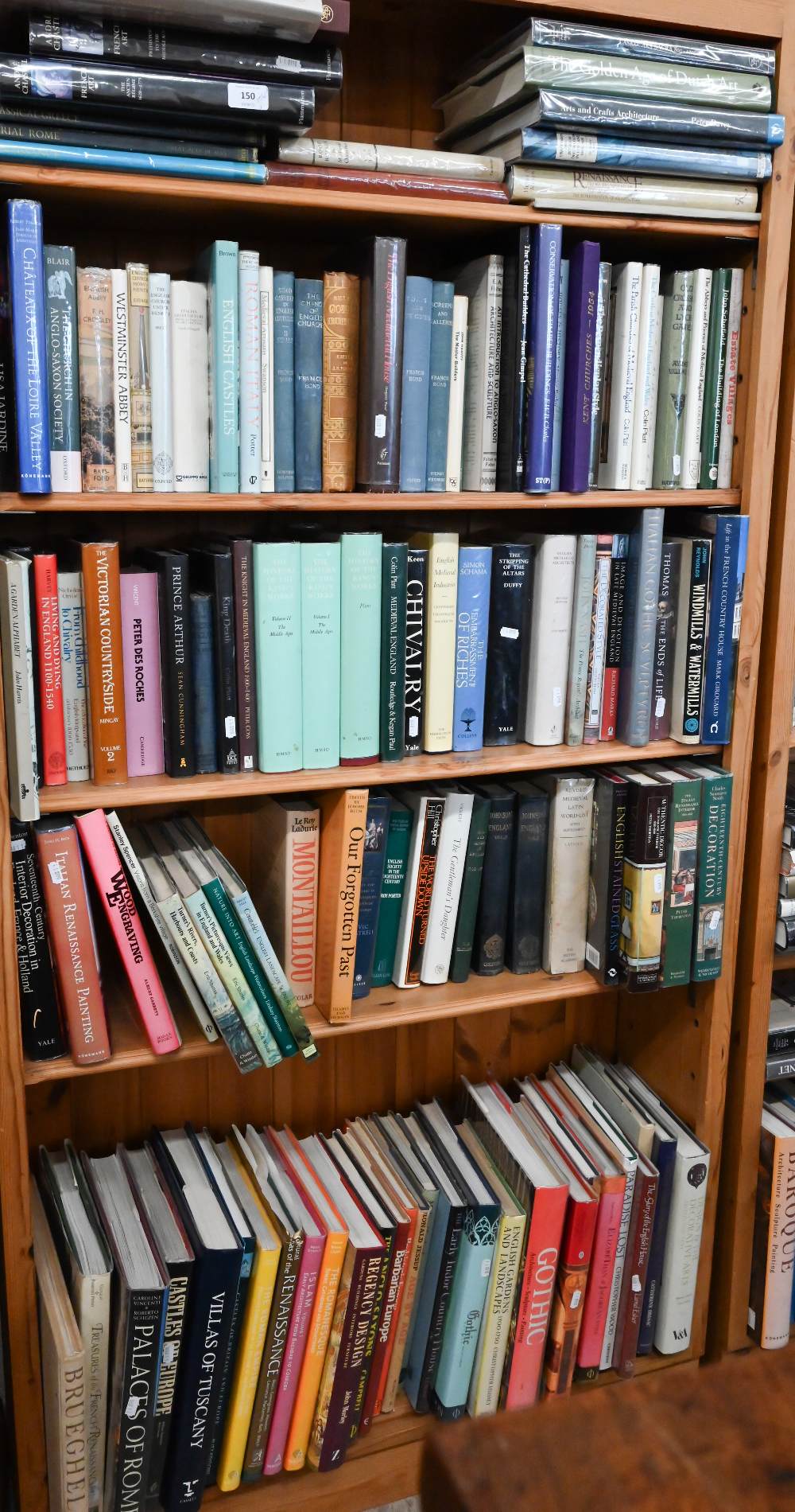 A large collection of books, mostly art and architecture, on five shelves