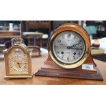 A Shreve, Crump & Low Co 'Chelsea Ship's Bell' marine clock in 14 cm brass drum case with teak stand