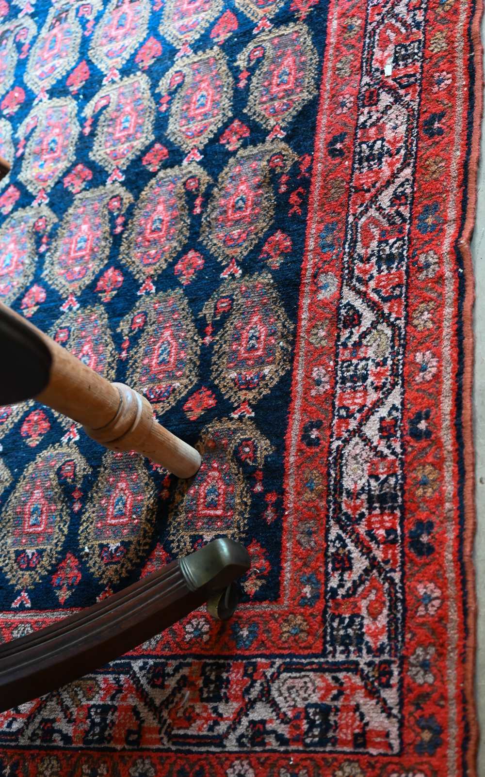 A Persian Senneh rug, the repeating boteh design on blue ground with red borders, 200 x 130 cm - Image 2 of 3