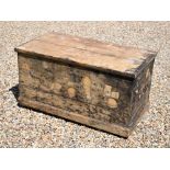 An old weathered and stained pine trunk, the interior with side drawer, 105 cm x 56 cm x 56 cm h