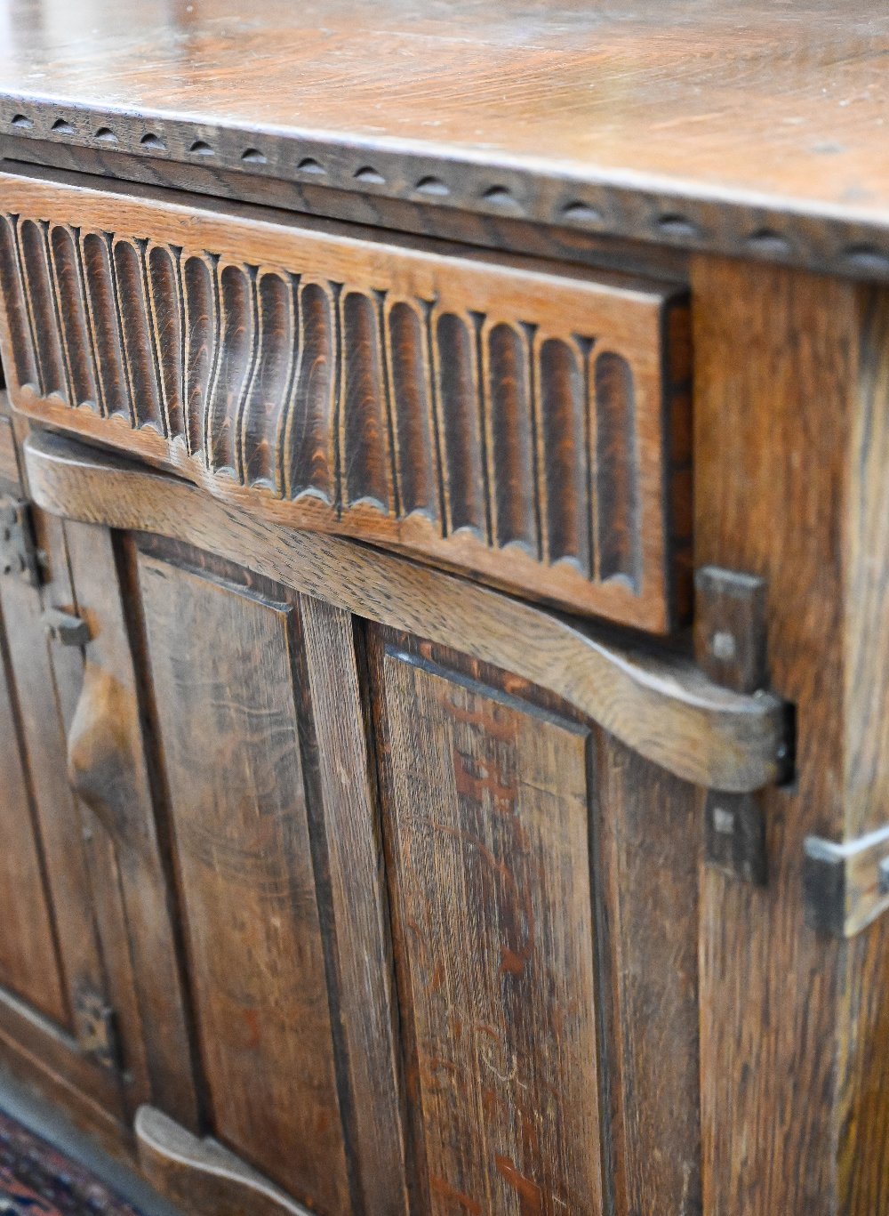 A Continental oak sideboard with three drawers over panelled cupboards, 172 cm wide x 42 cm x 80 - Image 3 of 4