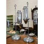 Two chrome adjustable oil lamps f/r