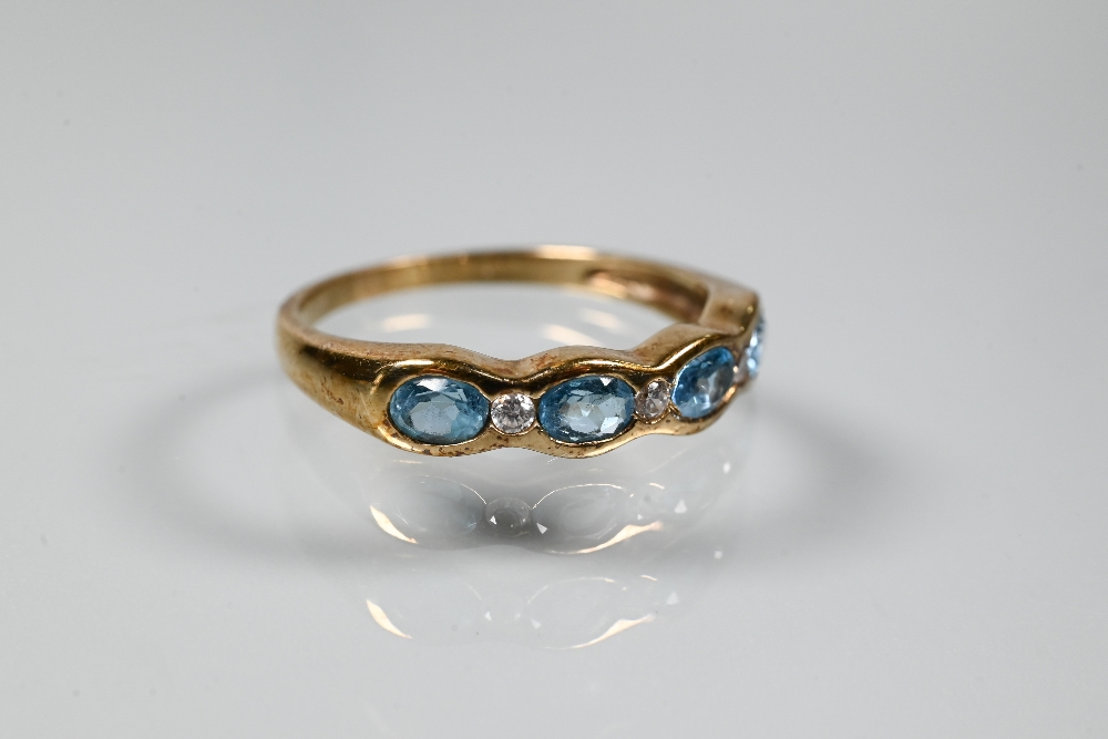 Five various rings, three set blue topaz, one channel set with coloured sapphires, one dark blue - Image 8 of 11