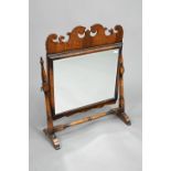 A Georgian style mahogany fret framed swing toilet mirror, 55 cm w x 68 cm h