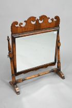 A Georgian style mahogany fret framed swing toilet mirror, 55 cm w x 68 cm h