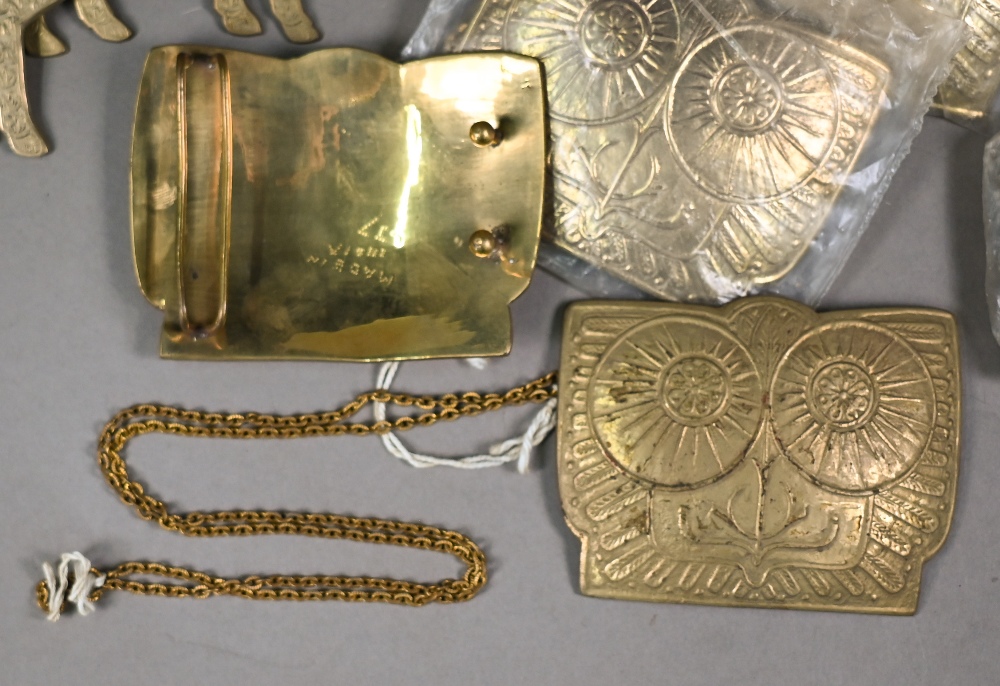 A collection of twenty Indian cast brass buckles, some in the form of standing rams, some with - Image 2 of 6