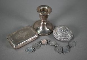 A 19th century oval silver snuff box with floral chased decoration in the Indian manner, Glasgow