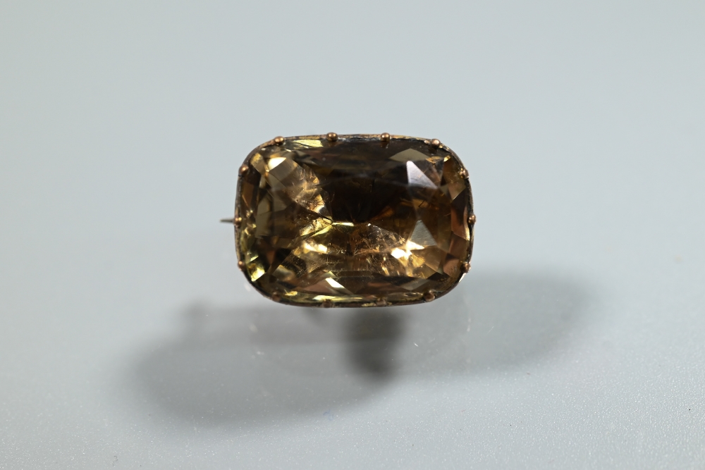 A Georgian foil back brooch set with a cushion-cut rock crystal, the unmarked yellow metal brooch - Image 2 of 4