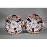 A pair of 18th century Chinese Imari phoenix and peach pattern plates, painted in the typical
