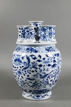 A 19th century Chinese blue and white tulip vase (tulipiere) with seven spouts, painted in tones