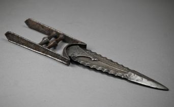 An antique Indian steel katar punch-dagger, the 24 cm blade with double scalloped edge, the floral-