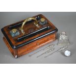 A Victorian inkstand with brass handle and drawer to/w three silver-handled button-hooks, a silver-