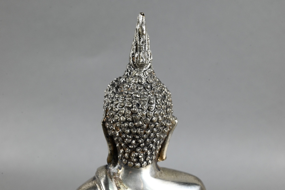 A 20th century silvered base-metal Thai figure of Shakyamuni Buddha with hands in the meditation - Image 5 of 6