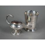 A small silver Christening mug, Birmingham 1935, to/w a small Aladdin's lamp style table lighter (