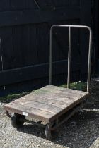 A small 1930s industrial trolley, by F Parr of Birmingham, with green painted tubular metal frame