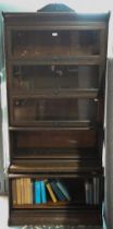 An oak five section Globe Wernicke style library bookcase, raised on a plinth base (faults) 87 cm